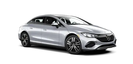 Silver Mercedes-Benz sedan shown in a front three-quarter view, featuring a sleek aerodynamic body, LED headlights, prominent grille, alloy wheels, and a modern luxury design on a transparent or black background.